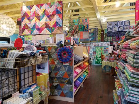 Rachel Smucker invites you to see the beautiful display of quilts in her new quilt shop on her Amish farm. . Best quilt shops near me